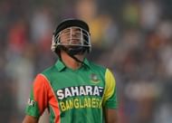 Bangladesh batsman Shakib Al Hasan leaves the field on losing his wicket during the second T20 cricket match between Bangladesh and Sri Lanka at The Zahur Ahmed Chowdhury Stadium in Chittagong on February 14, 2014. AFP PHOTO/ Munir uz ZAMAN        (Photo credit should read MUNIR UZ ZAMAN/AFP/Getty Images)